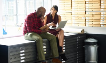 Two employees discussing over project