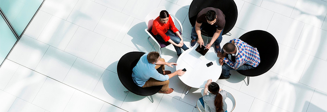 Group of professionals together and discussing