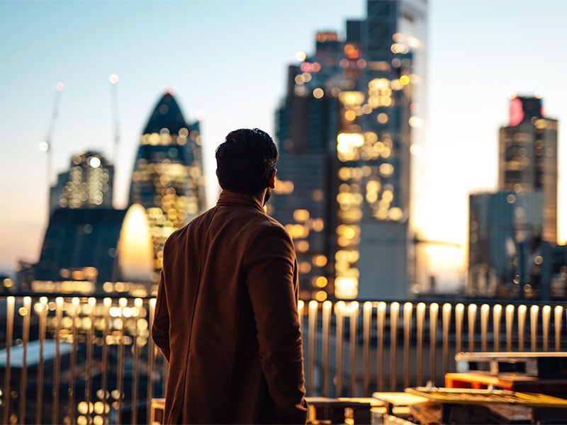A man looking something while standing